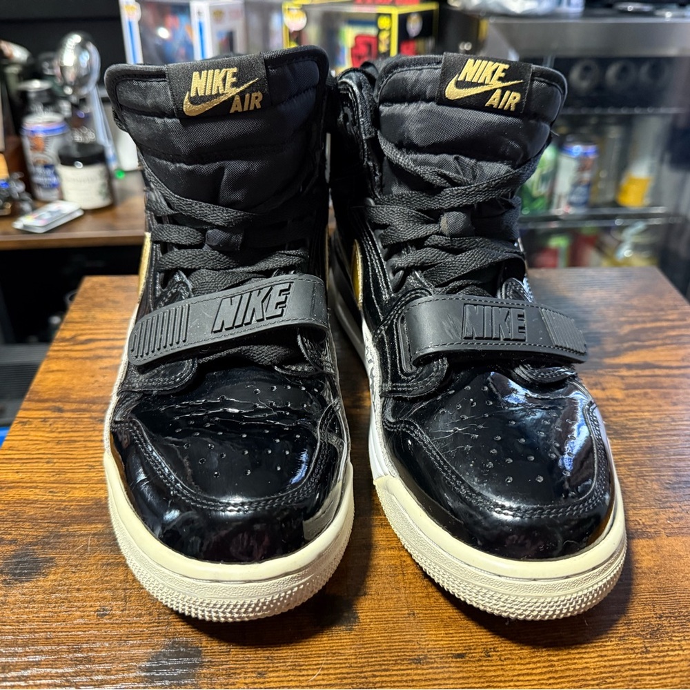 Jordan 312 Black and Gold High-Top Sneakers